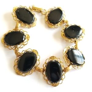 Vintage bracelet black oval cabochons fancy filigree gold tone linked panels